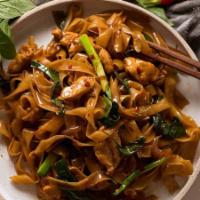 Pad Kee Mao · Wide rice noodles, basil, mushroom, bamboo shots, bell peppers, tomatoes, onions, scallions,...