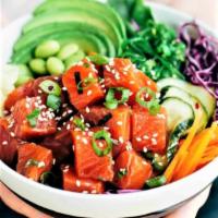 Salmon Poke Bowl · Fresh raw Salmon, sushi rice, pickled ginger, seaweed salad, avocado, pickled daikon, carrot...