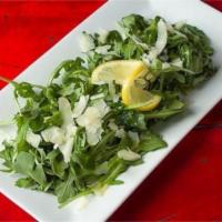 Arugula Salad · Wild arugula, shaved pecorino, lemon infused olive oil from Sorrento and a squeeze from a fr...