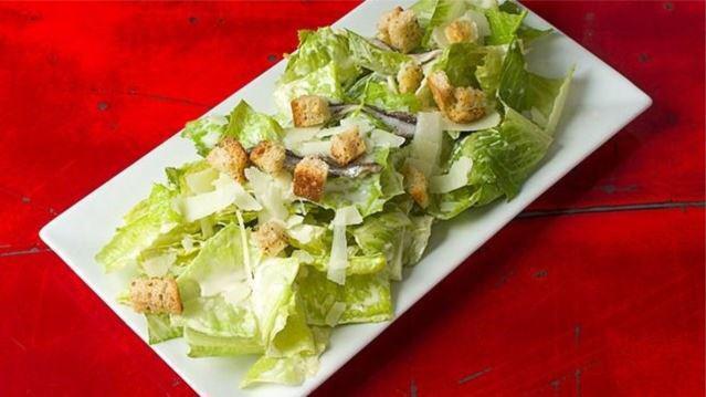 Caesar Salad · Romaine, anchovies, shaved pecorino, Neapolitan croutons and Luca's homemade Caesar dressing.