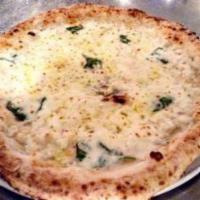 Bianca Pizza · DOP Buffalo mozzarella, ricotta, Pecorino Romano and basil.