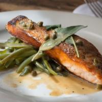 Salmon · Pan seared with lemon, capers, sage, split string beans and extra virgin olive oil. 