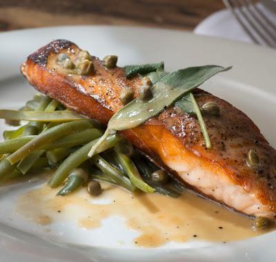 Salmon · Pan seared with lemon, capers, sage, split string beans and extra virgin olive oil. 