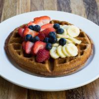 Whole Wheat Waffles · Made with Ten Fruits' almond milk topped with blueberries, strawberries and bananas. 