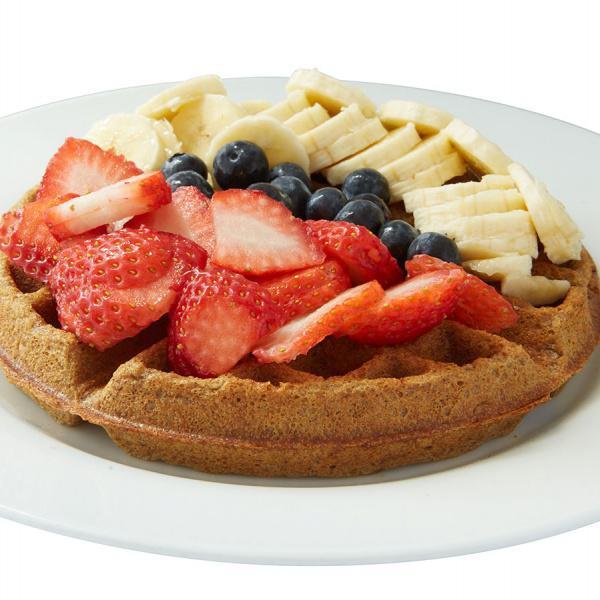 High Protein Whole Wheat Waffle · Made with Ten Fruits's almond milk and IsoPure whey protein. Topped with blueberries, strawberries and banana.