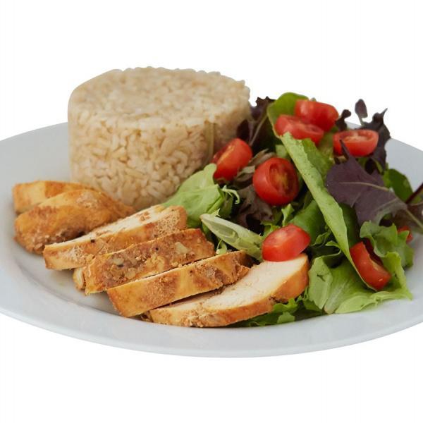 Roasted Chicken with Brown Rice and Salad · Peruvian-style roasted sliced chicken breast served with baby greens salad and whole grain brown rice.