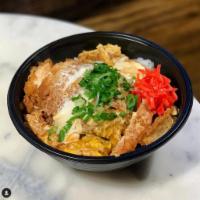 Chicken Katsu Don · Chicken cutlet cooked with egg and sliced onion in special Japanese sauce. Topped with scall...