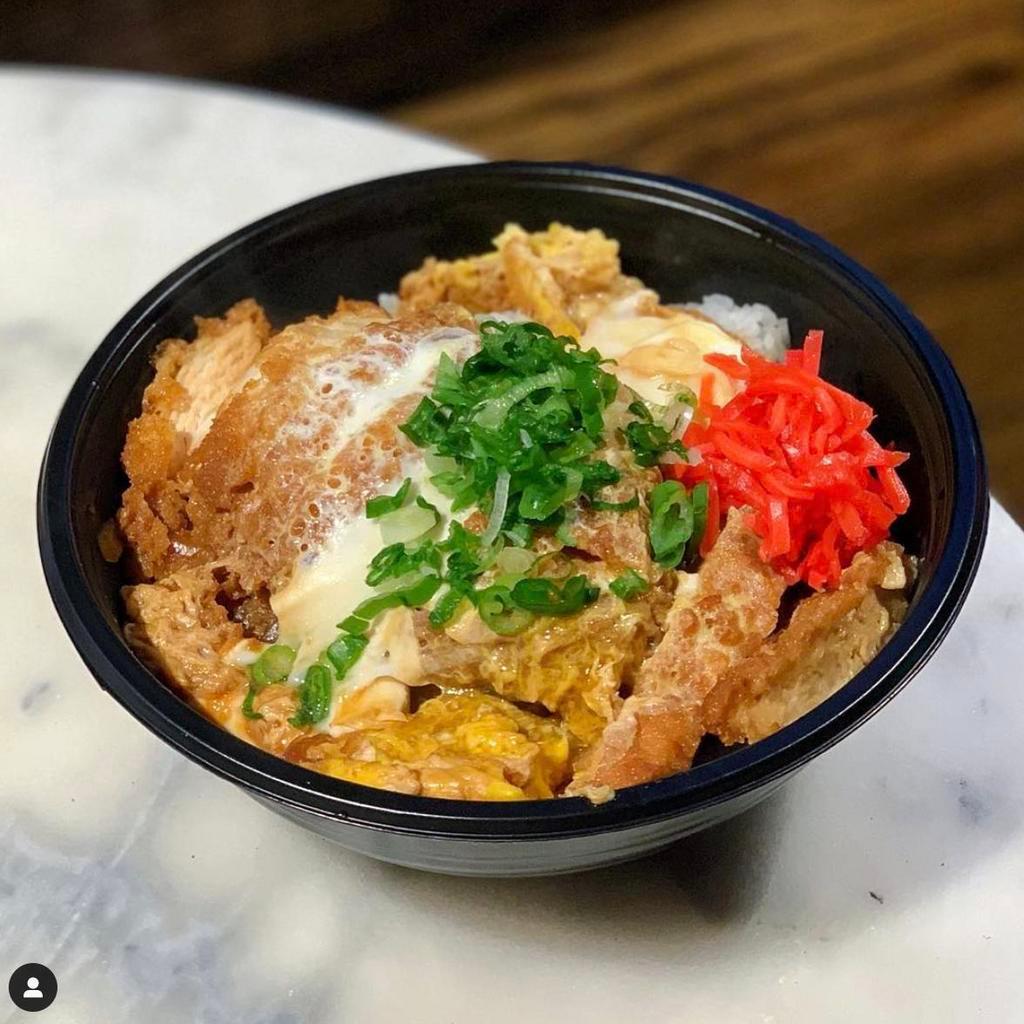 Chicken Katsu Don · Chicken cutlet cooked with egg and sliced onion in special Japanese sauce. Topped with scallion and pickled red ginger, served with rice.