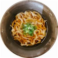 Kake Udon · Plain Japanese style udon noodle soup topped with scallion. 