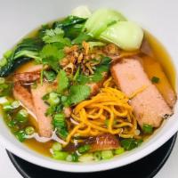 Ramen Soup · Clear sesame vegetable broth, yellow wheat noodles, Vegan Ham and bok choy.