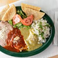 Huevos Rancheros · Your choice of eggs topped with our homemade ranchero sauce. Served with rice, beans and tor...