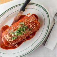 Market Burrito · Smothered with guajillo sauce, filled with cheddar cheese, lettuce and tomato.