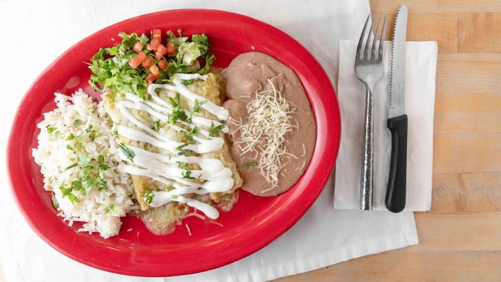 Enchiladas Verdes · Our homemade verde sauce, topped with chihuahua cheese, sour cream and cilantro.