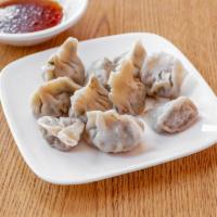 Handmade Dumplings · Fillings made with ground pork and chives, 1 order for 10 pieces.