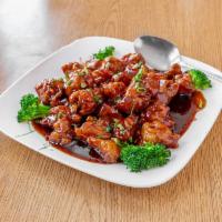 General Tso’s Chicken · Breaded chicken thighs deep fried and stir-fried with red sweet sauce with steam broccoli on...