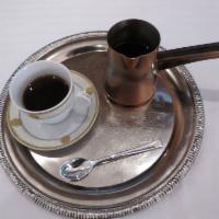 Turkish Coffee · Unfiltered coffee. Roasted and then finely ground coffee beans are simmered in a pot, and se...