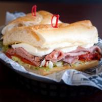 Italian Roast Beef Sandwich · Roast beef, fresh mozzarella, roasted peppers, mayo and lettuce on a grilled 8