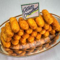 Potato Croquettes · Mashed Potato Blended w/ Cold Cuts, Fresh Mozzarella. Fried in Panko Japanese Bread Crumbs.