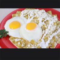 Chilaquiles Verdes · Con huevos estrellados o con huevos revueltos, quesp fresco, y crema Mexicana. Spicy conr to...
