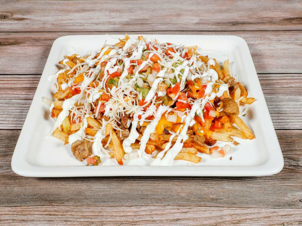 BCB Super Fries · Hand-cut fries, guacamole, cheese, sour cream, pico de gallo, and your choice of carne asada, pollo asado, or carnitas.