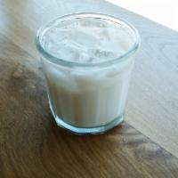 Horchata · House made rice water with dashes of cinammon, vanilla and cane sugar. 
