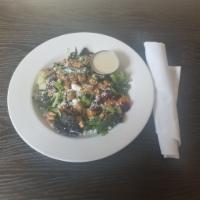 Roasted Beet Salad · Roasted beets, squash, candied walnuts, goat cheese served with a white balsamic vinaigrette 