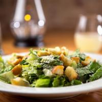 Caesar Salad · Romaine, Parmesan, Caesar dressing and croutons.