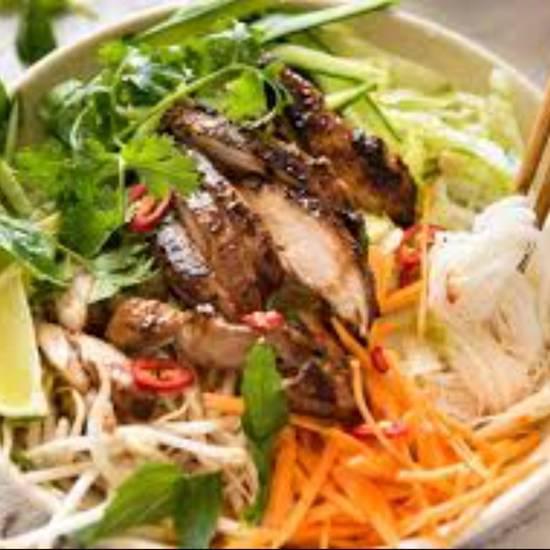 Chicken Vermicelli · Vermicelli rice noodles with lettuce, shredded purple cabbage,  cucumbers, pickled carrots, mint, topped with peanuts, fried shallots and side of house sweet fish sauce.
