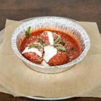Roasted Meatballs · Heartly meatballs topped with flippin pizza sauce and fresh ricotta. Then oven roasted with ...