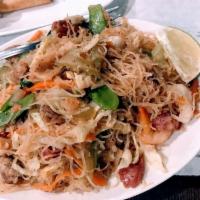 Pancit Bihon · Sauteed rice noodles cooked with vegetables, pork, shrimp and Chinese sausage.