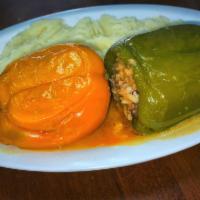 Punjena Paprika · Green peppers stuffed with ground beef and rice. Served with choice of rice or mashed potato...