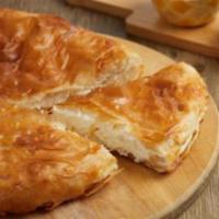 Traditional LAYERED CHEESE  Burek Pie -BAKE AT HOME  · 10 inch 900 grams traditional burek pie. Frozen, bake home option. 30
Min of baking @450 deg...