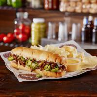 The Texican Cheesesteak · Texadelphia favorite. Beef, grilled onions, mozzarella, jalapenos, a 2 oz. side of queso.