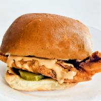 Spicy Chicken Sandwich · Brioche bun served with spicy chipotle mayo and pickles.