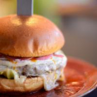 El Jim Burger · Provolone cheese, Gorgonzola mousse, pickled red onions and habanero butter.