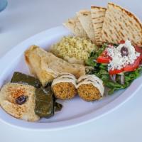 Veggie Combo Platter · 2 dolmas, 2 falafel balls, 2 spanakopitas and hummus dip. Choice of 2 side dishes: Greek sal...
