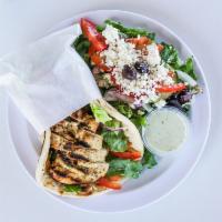 Chicken Pita · Sandwiches are stuffed with tomatoes, onions and mixed lettuce. Served with Greek yogurt sau...