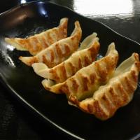 A-2. Six Pieces Gyoza · Pan-Fried Dumplings choice of  pork, chicken or veggies.