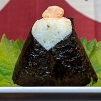 A-7. Onigiri  · Rice ball wrapped in nori (seaweed) choice of salmon, chashu, or Takana (pickled mustard leaf)