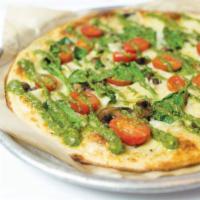 Veggie Pesto Pizza · This one’s for the Veggie Lovers.  Packed with flavor, the Veggie Pesto Pizza is crafted wit...