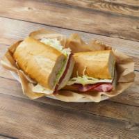 Spicy Italian Cold Sandwich · Hot capicola, pepperoni, spicy sopressate, provolone cheese, lettuce, tomato and homemade dr...