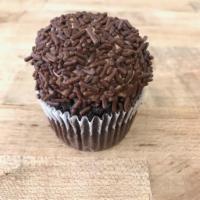 Death by Chocolate Cupcake · Chocolate cake with chocolate. buttercream, covered with chocolate sprinkles.