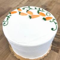 Carrot Cake · Carrot cake, cream cheese frosting filling and outside.