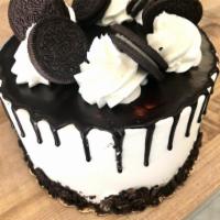 Cookies & Cream Cake · Chocolate cake, cookies & cream filling, iced in vanilla buttercream with a chocolate ganach...