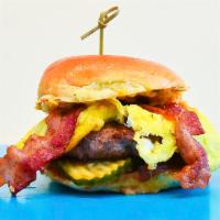 BRUNCH BURGER · Angus Beef, Pimento Cheese, Applewood-Smoked Bacon, Fried Egg, Pickles, Apple Butter