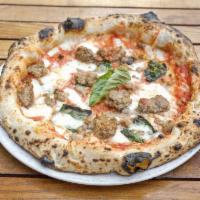 Vestuti Pizza · Tomato sauce, sausage, homemade mozzarella and fresh basil. Contains extra virgin olive oil.