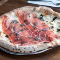 Tartufata Pizza · Homemade mozzarella, truffle pate, prosciutto di Parma and Parmigiano Reggiano. White pizza ...