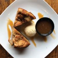 Bread Pudding · Served with bourbon caramel sauce. *Ice cream not included for to-go Bread Pudding.