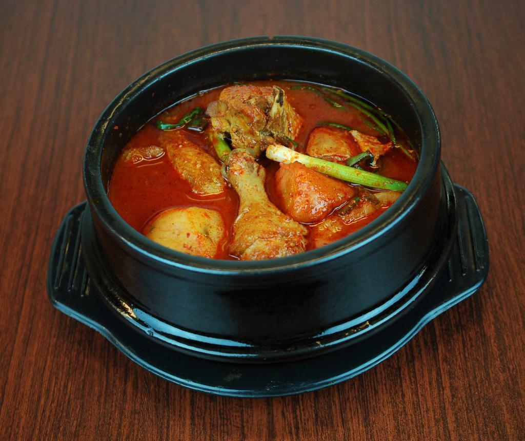 26. Dak Dori Tang · Spicy chicken stew with potatoes, carrots, and onion.