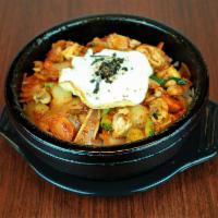29. Haemul Dolsot Bibimbap · Spicy mixed seafood stir fry and an egg over rice in a hot stone pot. No rice.